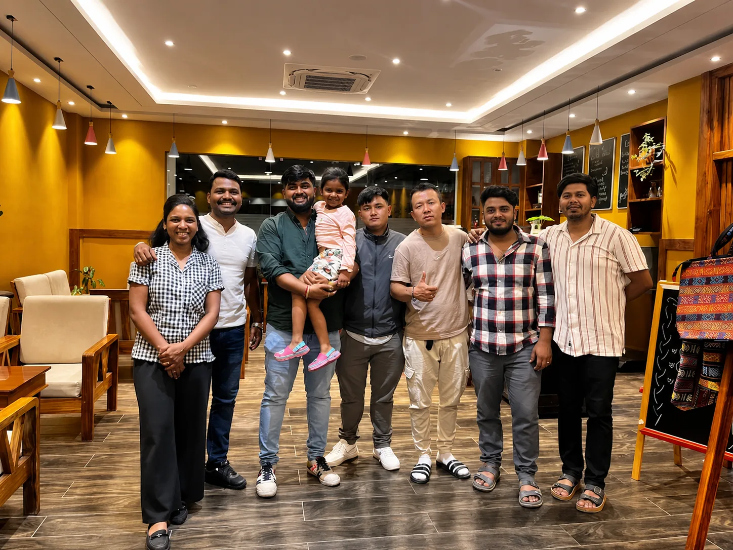 A Cross Over Holidays group with their guide at the lodge after a Himalayan tour